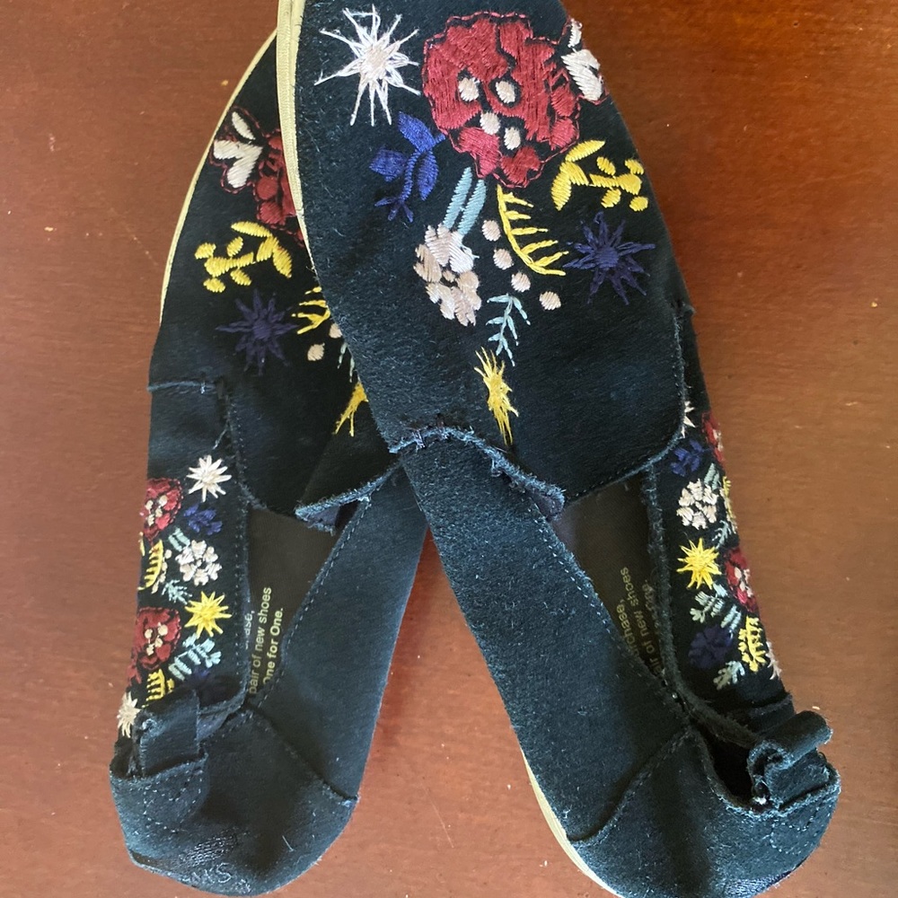 Toms black suede floral flat shoes